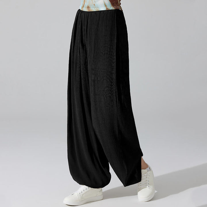 Pantaloni da yoga da donna Olivenorma a vita alta con elastico in vita e texture stropicciata, modello harem ampio. - Nero - L - image 9