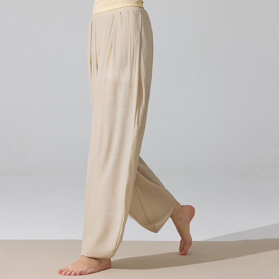 Pantaloni da yoga da donna Olivenorma a vita alta con elastico in vita e texture stropicciata, modello harem ampio. - image 3