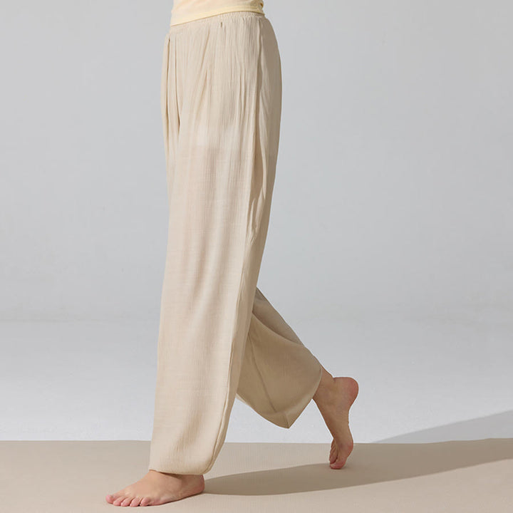 Pantaloni da yoga da donna Olivenorma a vita alta con elastico in vita e texture stropicciata, modello harem ampio. - image 3
