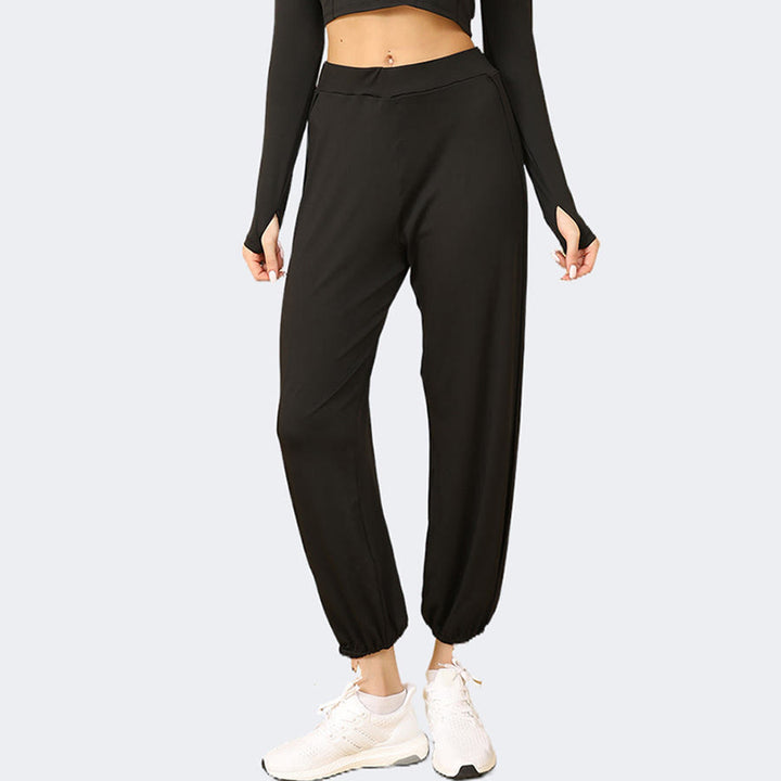 Pantaloni da jogging da donna Olivenorma a vita alta con doppio spacco laterale e inserti in tessuto morbido, ideali per yoga. - image 3