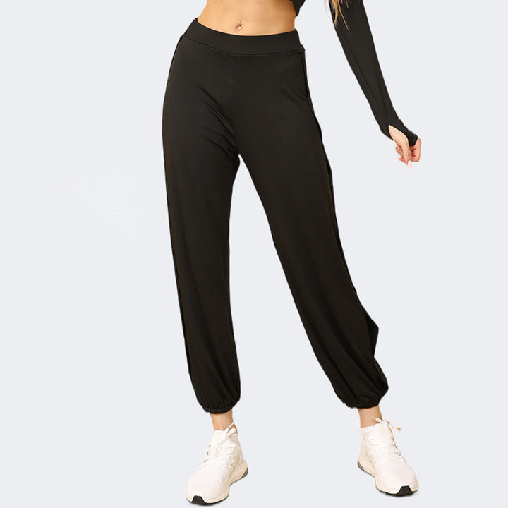 Pantaloni da jogging da donna Olivenorma a vita alta con doppio spacco laterale e inserti in tessuto morbido, ideali per yoga. - image 4