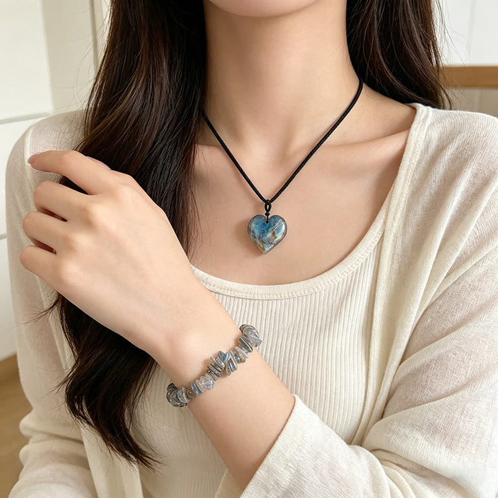 Bracciale Olivenorma con ciondolo a forma di cuore in cristallo e simbolo d'amore - image 3