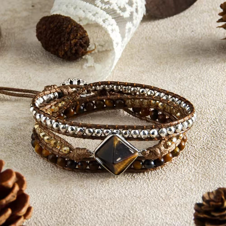 Bracciale avvolgente intrecciato a mano Olivenorma con simbolo energetico e magnete occhio di tigre naturale. - Marrone scuro - image 0