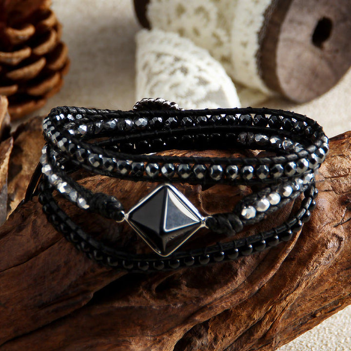 Bracciale avvolgente intrecciato a mano Olivenorma con simbolo energetico e magnete occhio di tigre naturale. - image 3