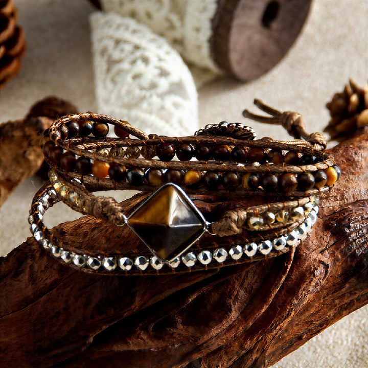 Bracciale avvolgente intrecciato a mano Olivenorma con simbolo energetico e magnete occhio di tigre naturale. - image 1