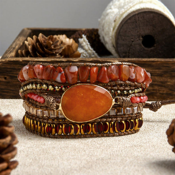 Bracciale Olivenorma in ematite a più file, intrecciato a mano, stile boho casual con simbolo di equilibrio. - Rosso - image 0