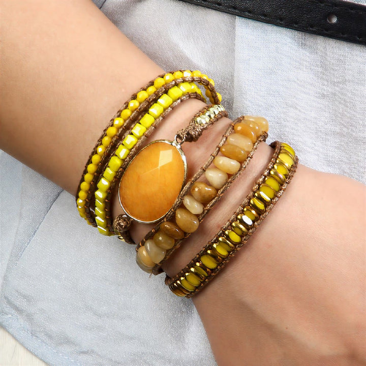 Bracciale Olivenorma in ematite a più file, intrecciato a mano, stile boho casual con simbolo di equilibrio. - image 6