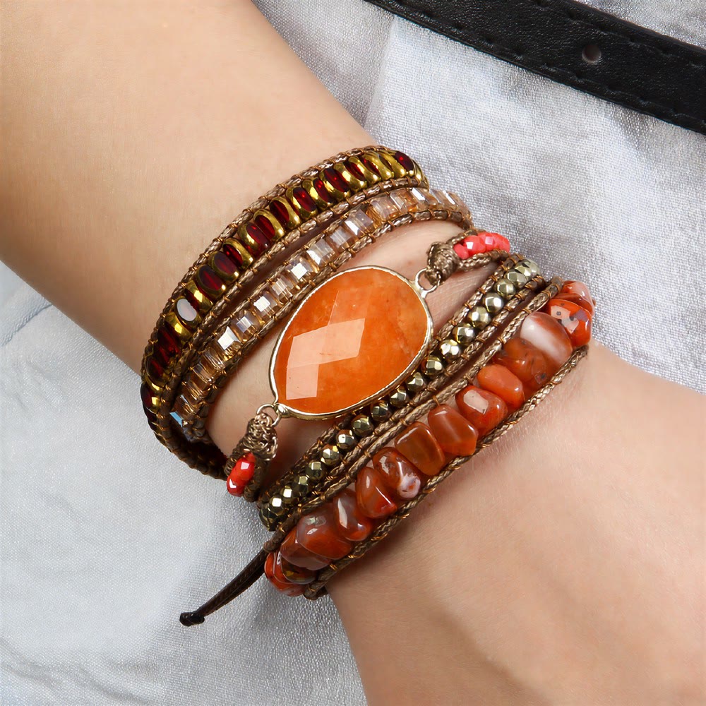 Bracciale Olivenorma in ematite a più file, intrecciato a mano, stile boho casual con simbolo di equilibrio. - image 2