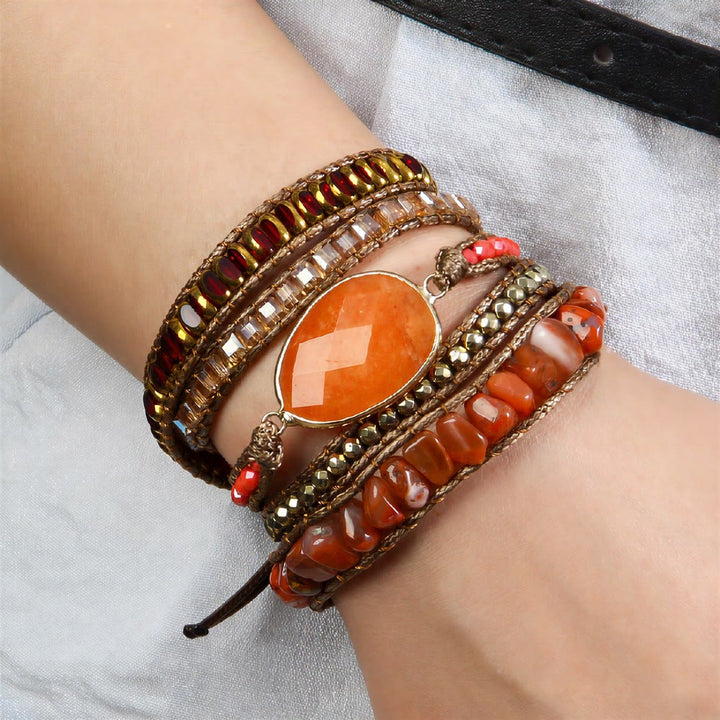 Bracciale Olivenorma in ematite a più file, intrecciato a mano, stile boho casual con simbolo di equilibrio. - image 2