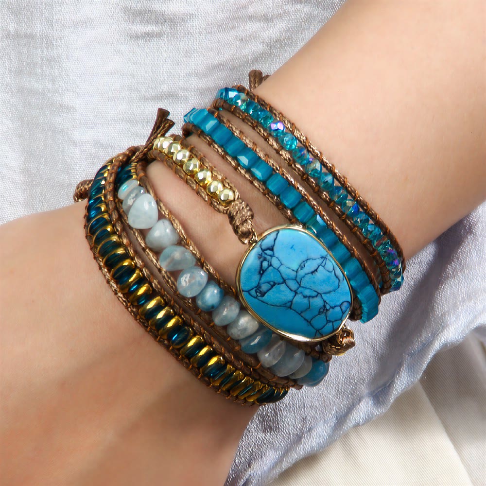 Bracciale Olivenorma in ematite a più file, intrecciato a mano, stile boho casual con simbolo di equilibrio. - image 4