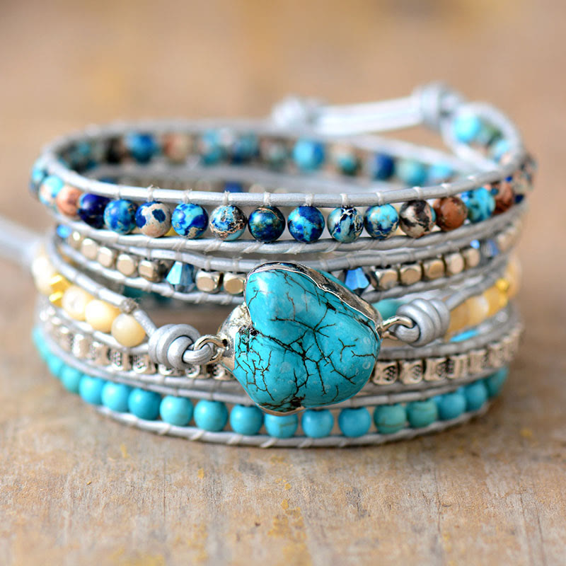 Bracciale Olivenorma con 5 maglie avvolte in pelle turchese e simbolo spirituale, lavorato a mano. - Turchese - image 0