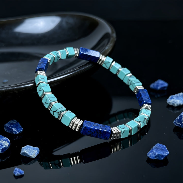Bracciale Olivenorma con perline tubolari quadrate in turchese e lapislazzuli naturali e dalla texture particolare, per attirare ricchezza, abbondanza e prosperità. - image 4