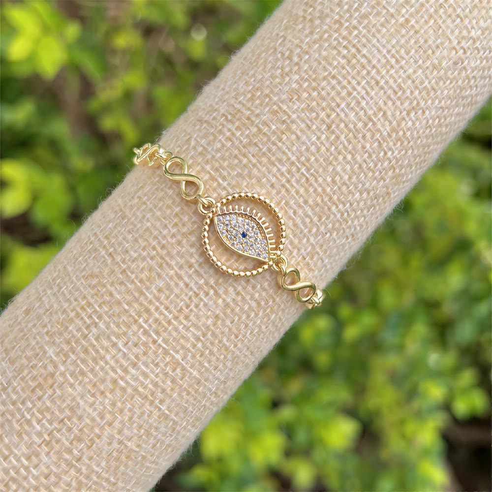 Bracciale Olivenorma in rame con ciondolo a forma di occhio di Allah e simbolo di protezione. - Doppio anello con occhio di Allah tempestato di pavé - image 4