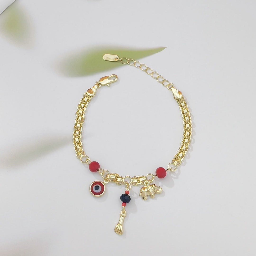 Bracciale Olivenorma in rame con ciondolo a forma di elefante e occhio di Allah, simbolo di benedizione e protezione. - Perla rossa - image 2