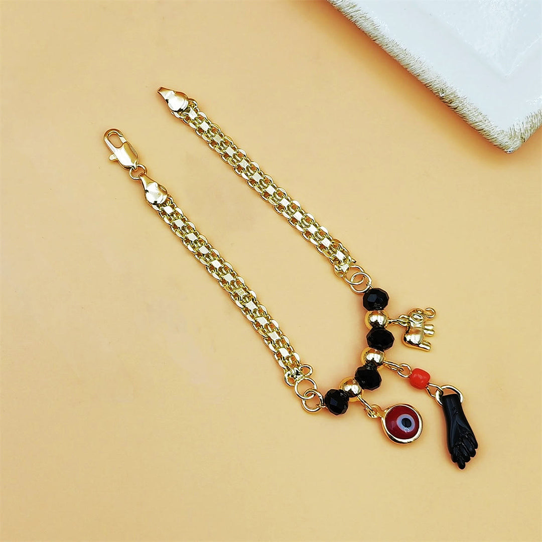 Bracciale Olivenorma in rame con ciondolo a forma di elefante e occhio di Allah, simbolo di benedizione e protezione. - image 1