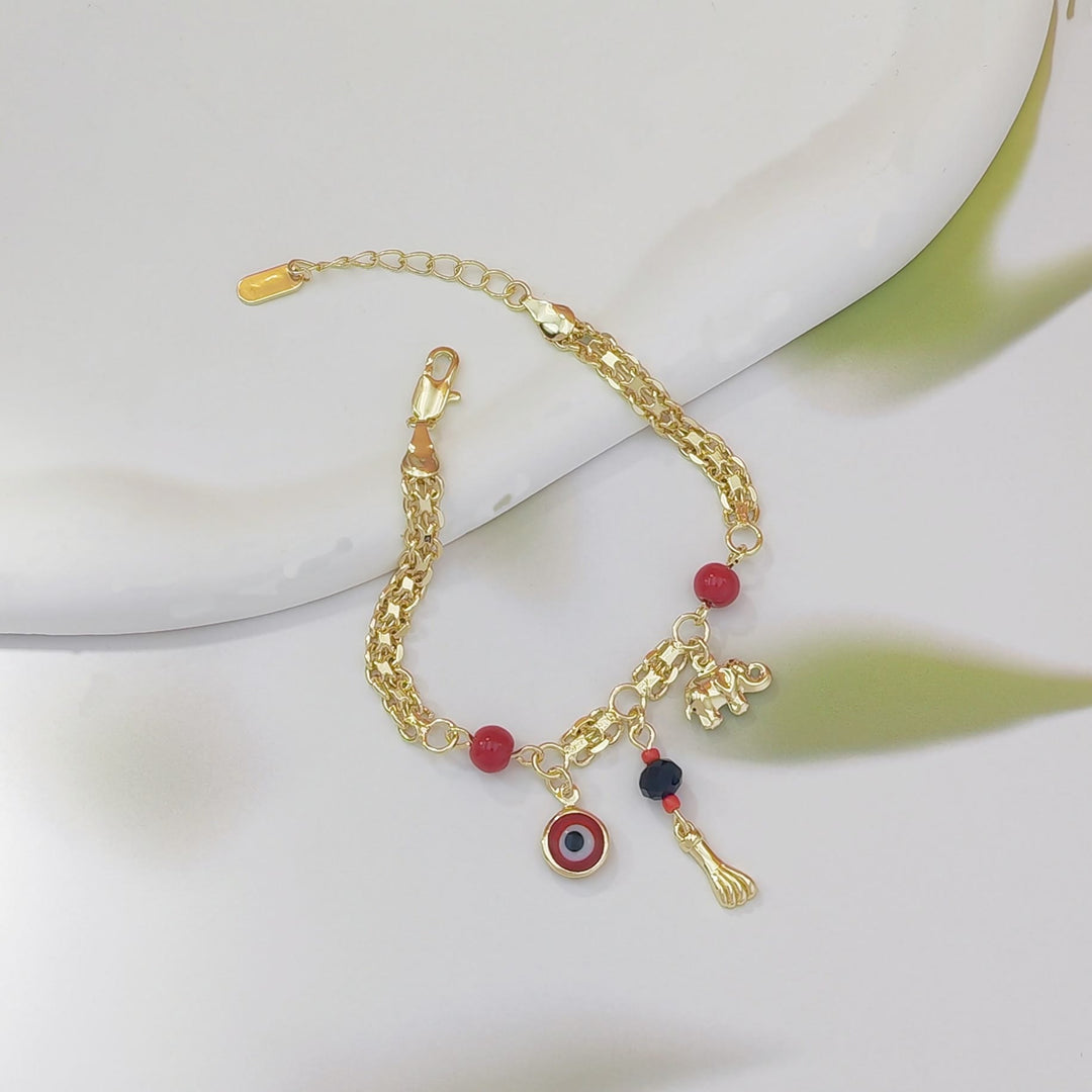 Bracciale Olivenorma in rame con ciondolo a forma di elefante e occhio di Allah, simbolo di benedizione e protezione. - image 6