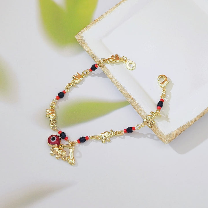 Bracciale Olivenorma con ciondolo a forma di occhio di Allah in perline di rame e simbolo di protezione. - Per adulti B - image 2