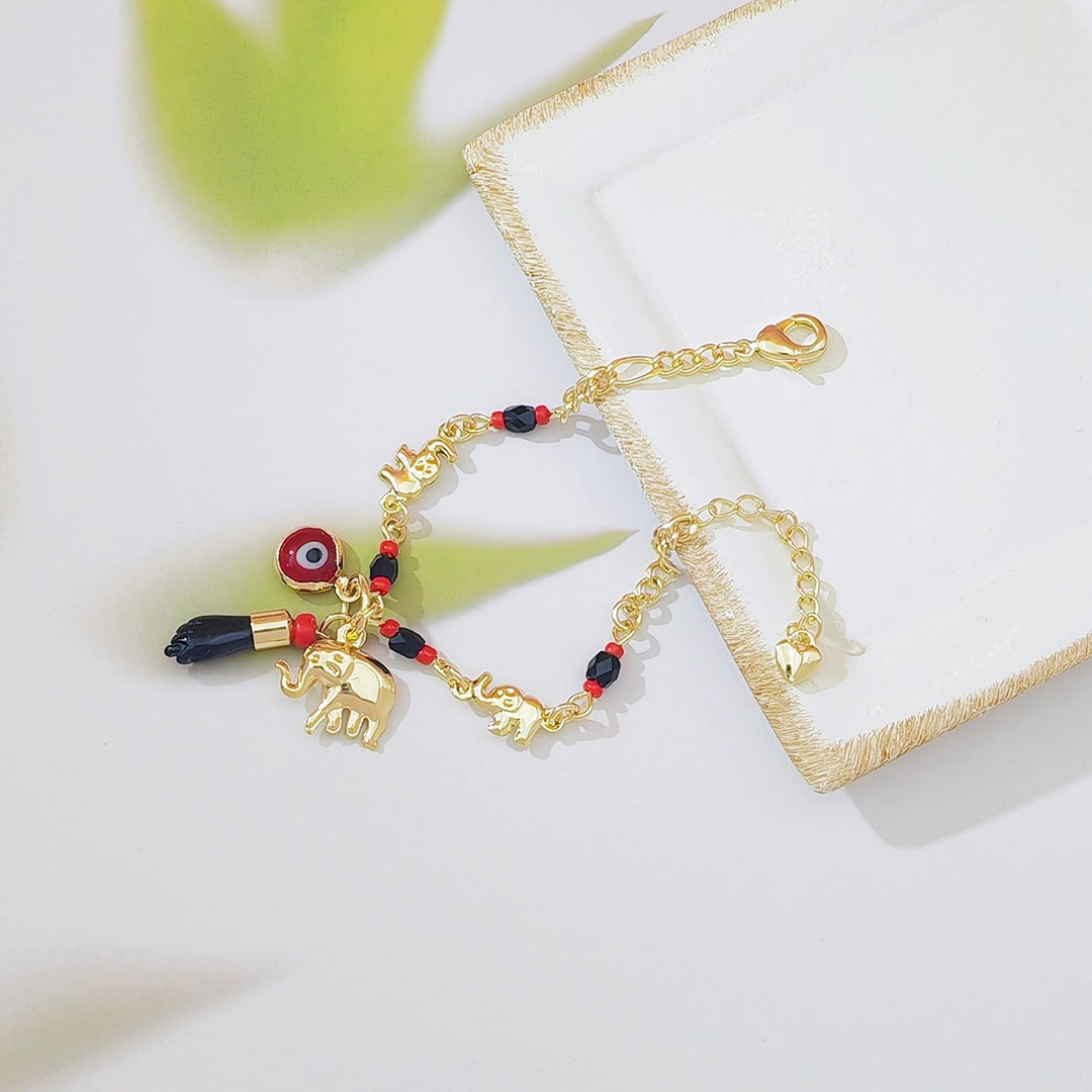 Bracciale Olivenorma con ciondolo a forma di occhio di Allah in perline di rame e simbolo di protezione. - image 4