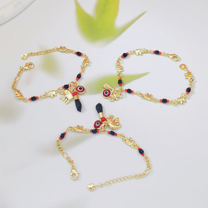 Bracciale Olivenorma con ciondolo a forma di occhio di Allah in perline di rame e simbolo di protezione. - image 6