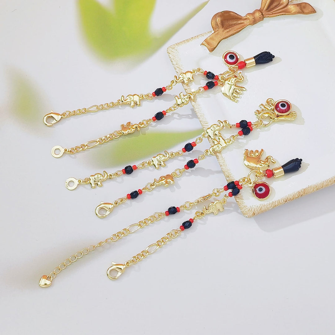 Bracciale Olivenorma con ciondolo a forma di occhio di Allah in perline di rame e simbolo di protezione. - image 8