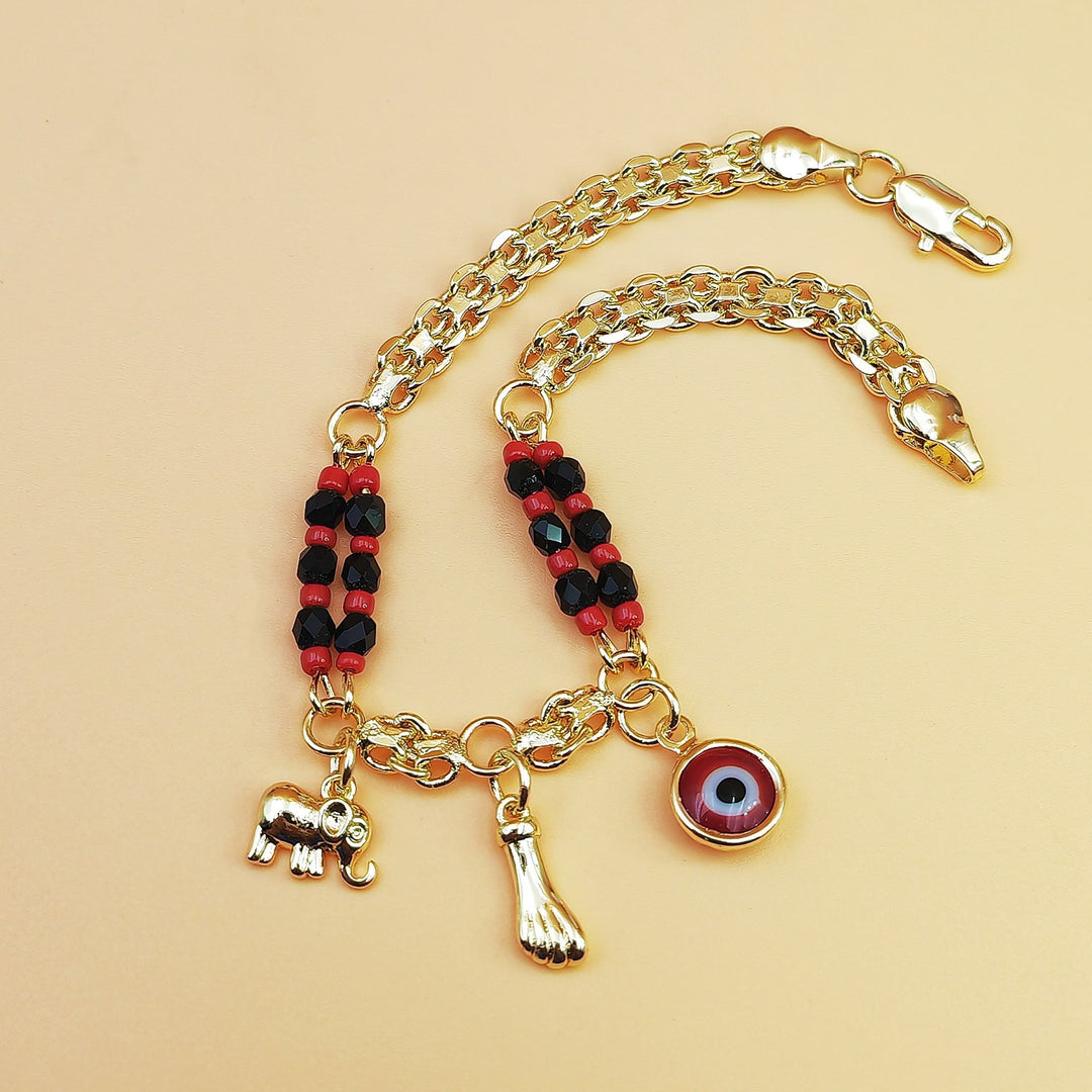 Bracciale Olivenorma in rame con perline miste e ciondoli multipli, simbolo di benedizione. - image 2