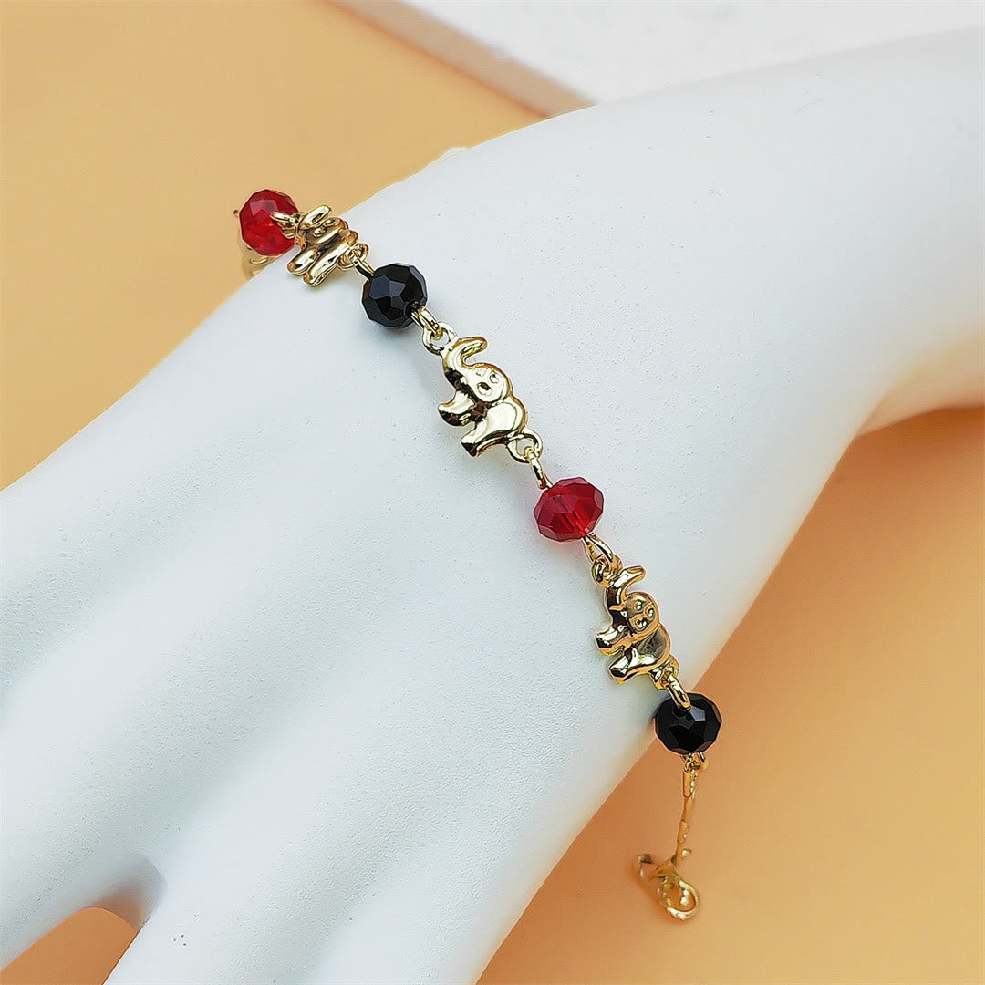 Bracciale Olivenorma in rame con ciondolo a più elefanti, simbolo di benedizione. - image 6