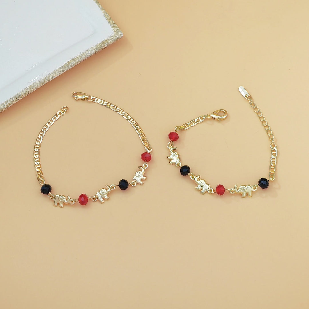 Bracciale Olivenorma in rame con ciondolo a più elefanti, simbolo di benedizione. - image 3