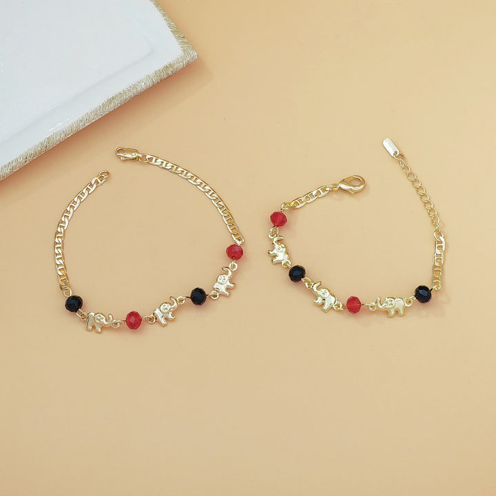Bracciale Olivenorma in rame con ciondolo a più elefanti, simbolo di benedizione. - image 3