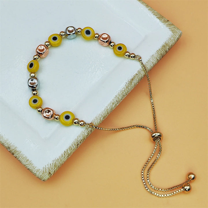 Bracciale Olivenorma in rame con perline colorate a forma di occhio di Allah e simbolo di benedizione. - Giallo - image 3