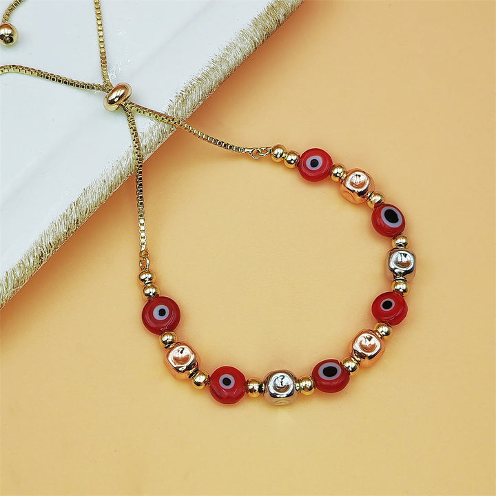 Bracciale Olivenorma in rame con perline colorate a forma di occhio di Allah e simbolo di benedizione. - Rosso - image 1