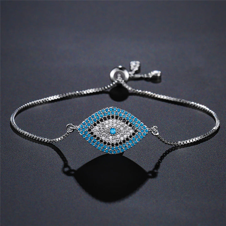 Bracciale Olivenorma in rame con intarsio a forma di occhio di Allah e simbolo di protezione. - B - image 2