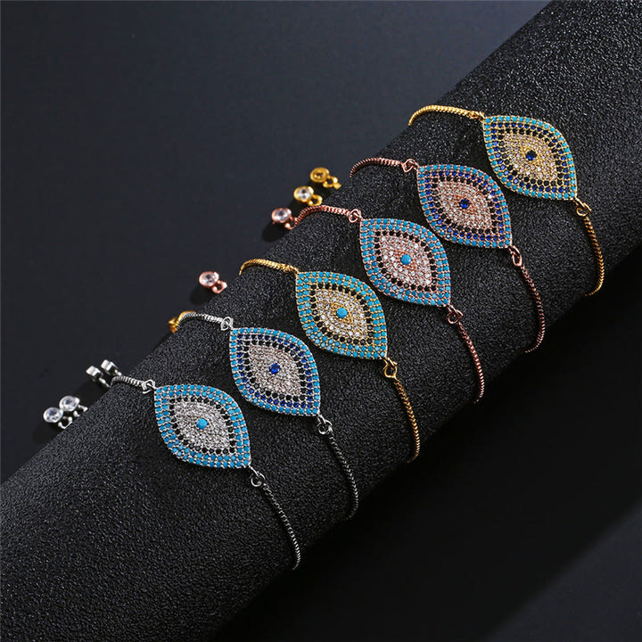 Bracciale Olivenorma in rame con intarsio a forma di occhio di Allah e simbolo di protezione. - image 0