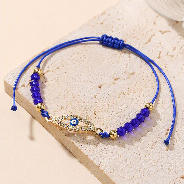 Bracciale Olivenorma in rame con ciondolo a forma multipla di occhio di Allah e simbolo di protezione. - image 5