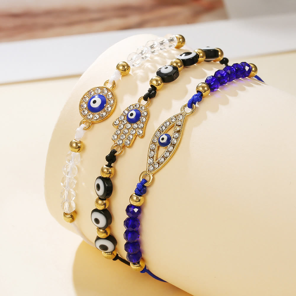 Bracciale Olivenorma in rame con ciondolo a forma multipla di occhio di Allah e simbolo di protezione. - Nero, Blu e Bianco - image 0