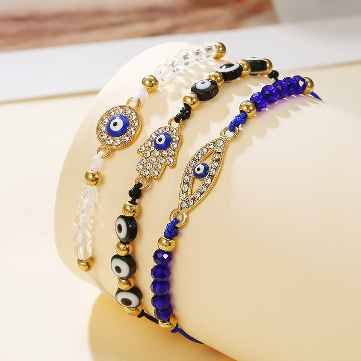 Bracciale Olivenorma in rame con ciondolo a forma multipla di occhio di Allah e simbolo di protezione. - Nero, Blu e Bianco - image 0