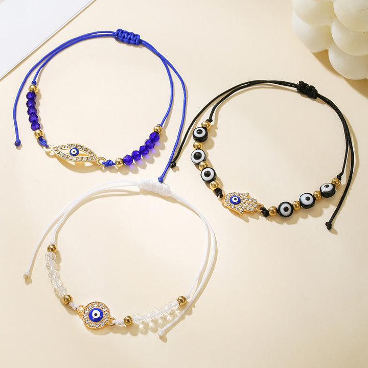 Bracciale Olivenorma in rame con ciondolo a forma multipla di occhio di Allah e simbolo di protezione. - image 1