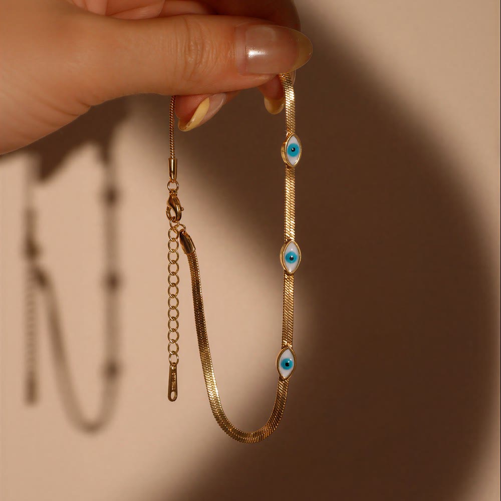 Bracciale Olivenorma in acciaio inossidabile con triplo occhio di Allah e catena a serpente, simbolo di protezione. - image 2