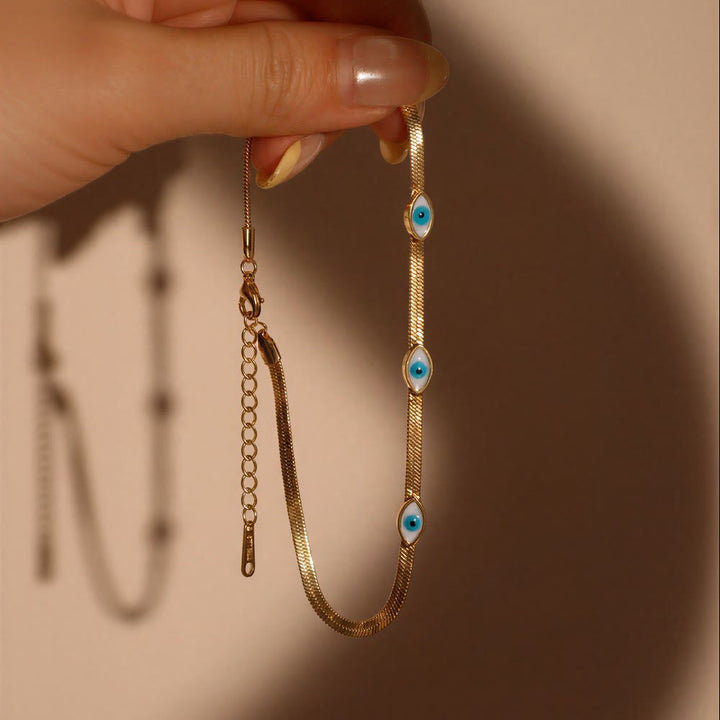 Bracciale Olivenorma in acciaio inossidabile con triplo occhio di Allah e catena a serpente, simbolo di protezione. - image 2