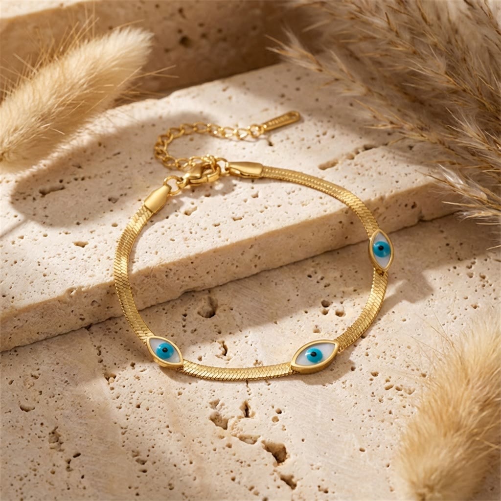 Bracciale Olivenorma in acciaio inossidabile con triplo occhio di Allah e catena a serpente, simbolo di protezione. - image 1