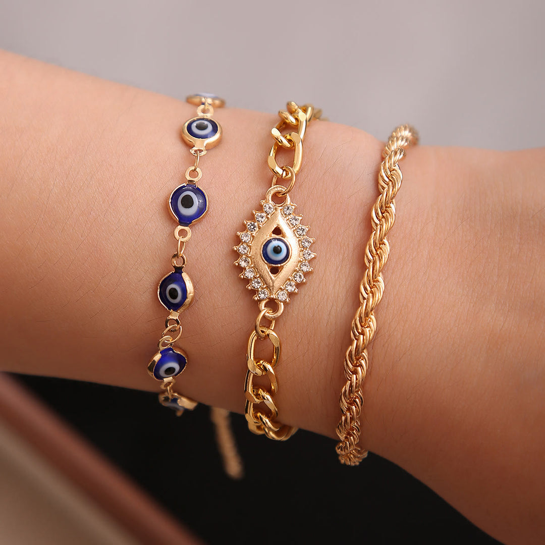Bracciale Olivenorma in lega con ciondolo a forma di occhio di Allah e strass, simbolo di benedizione. - Set da 3 - image 0