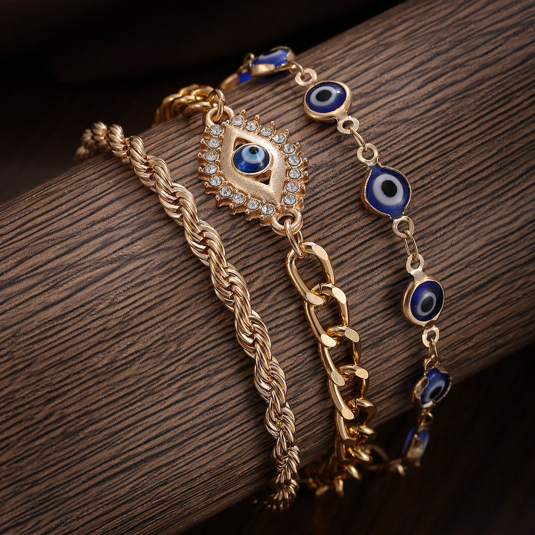Bracciale Olivenorma in lega con ciondolo a forma di occhio di Allah e strass, simbolo di benedizione. - image 1