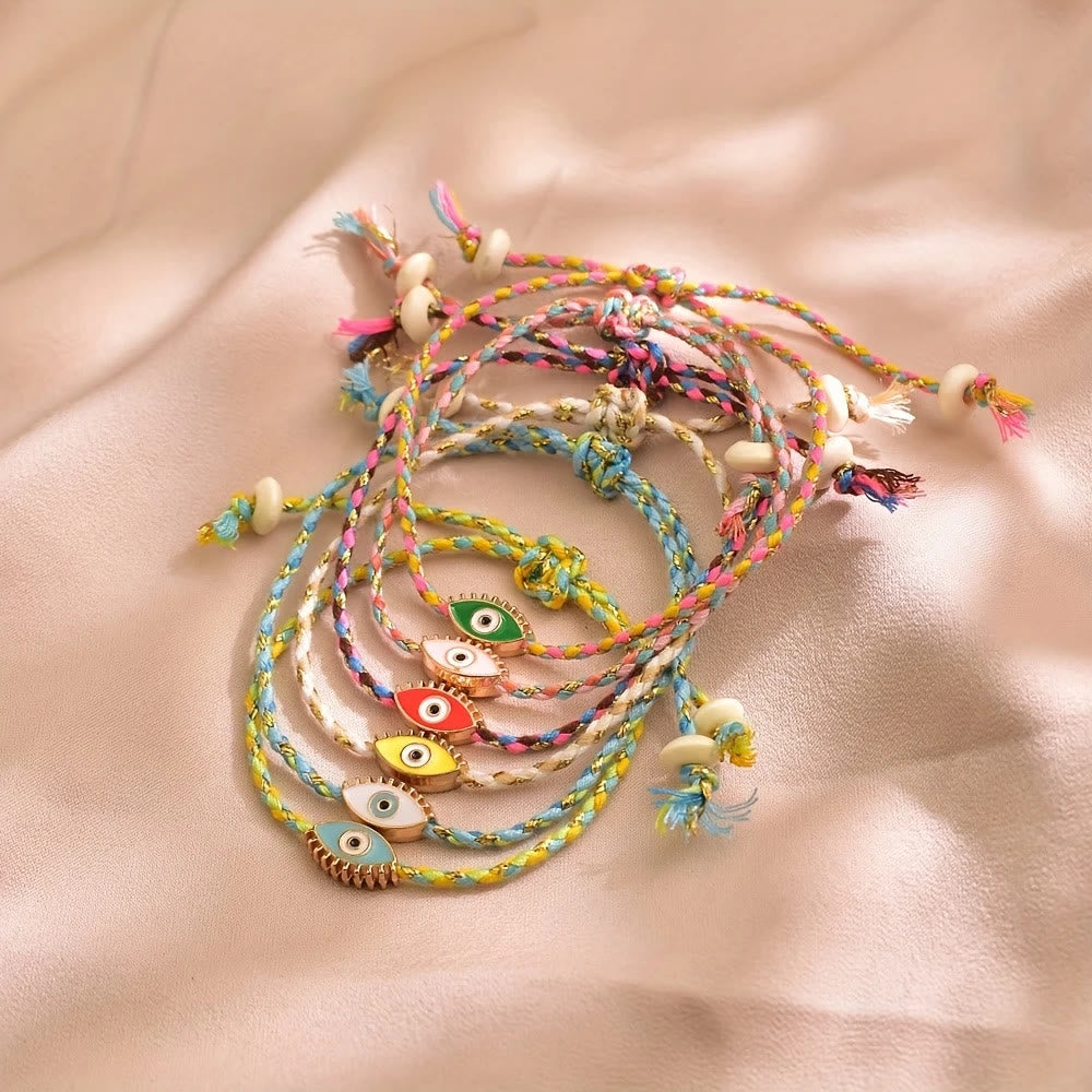 Bracciale Olivenorma in lega con nappa colorata a forma di occhio di Allah e simbolo di benedizione. - image 1