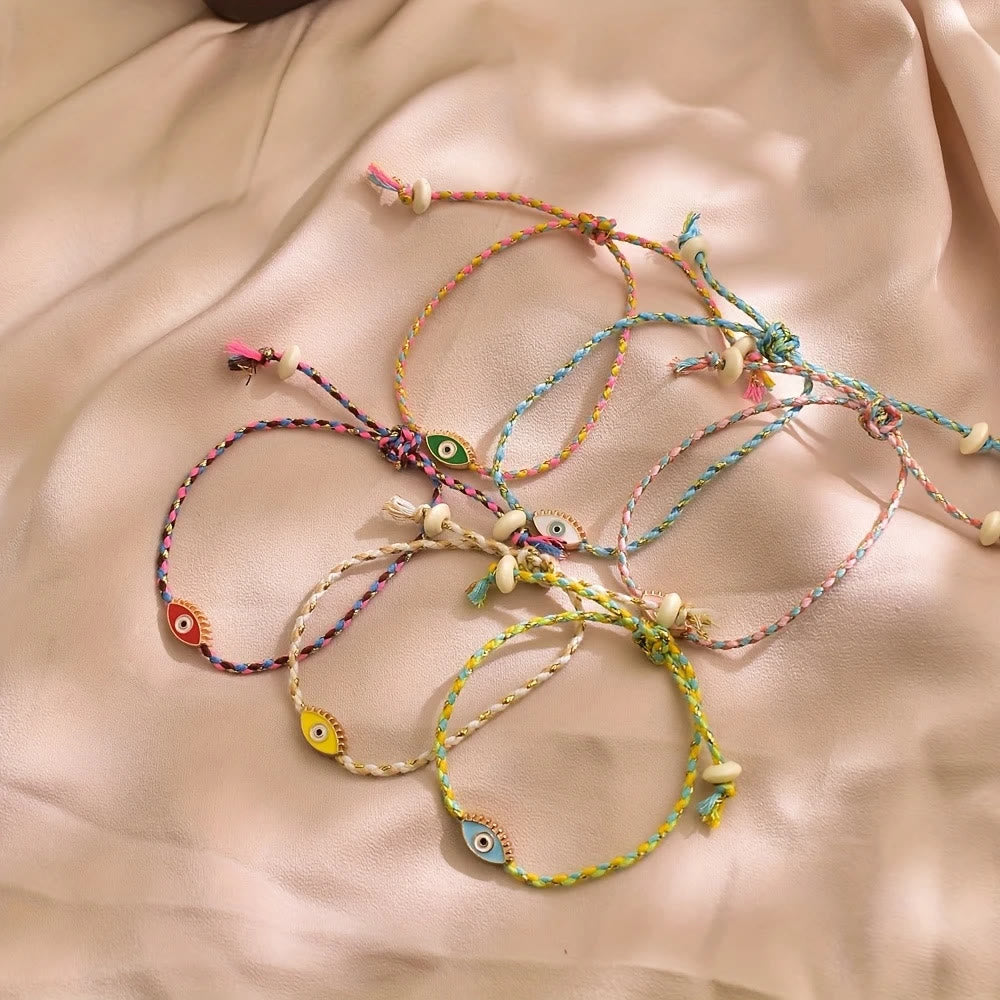 Bracciale Olivenorma in lega con nappa colorata a forma di occhio di Allah e simbolo di benedizione. - image 2