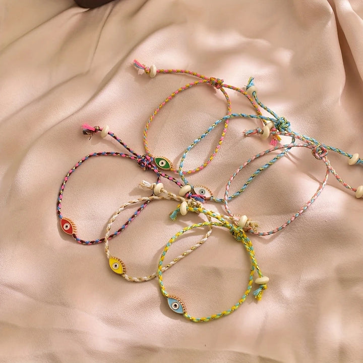 Bracciale Olivenorma in lega con nappa colorata a forma di occhio di Allah e simbolo di benedizione. - image 2