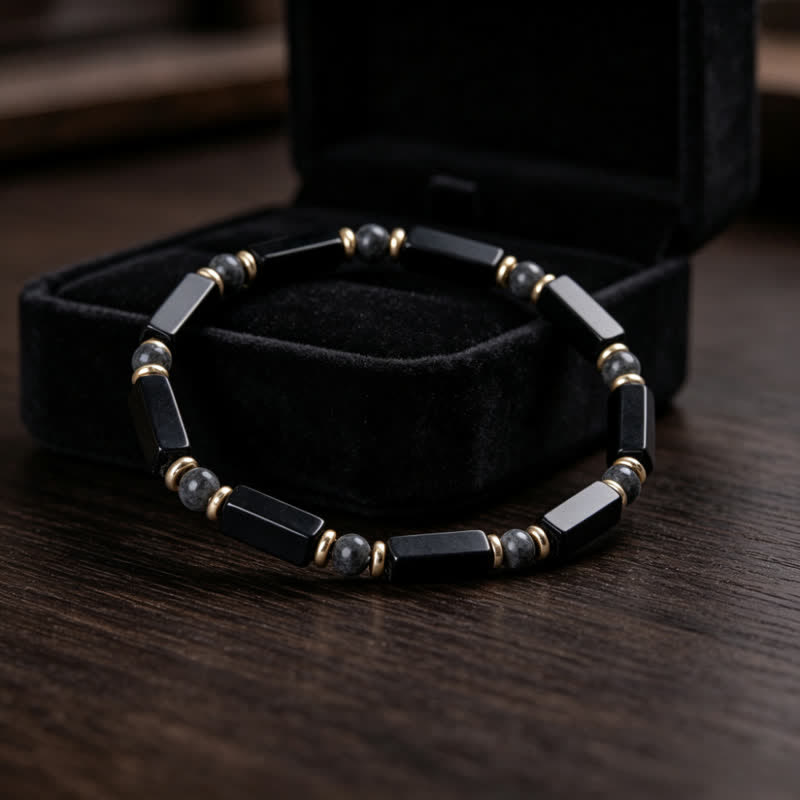 Bracciale Olivenorma con perline in pietra naturale e simbolo di protezione e resistenza. - image 3
