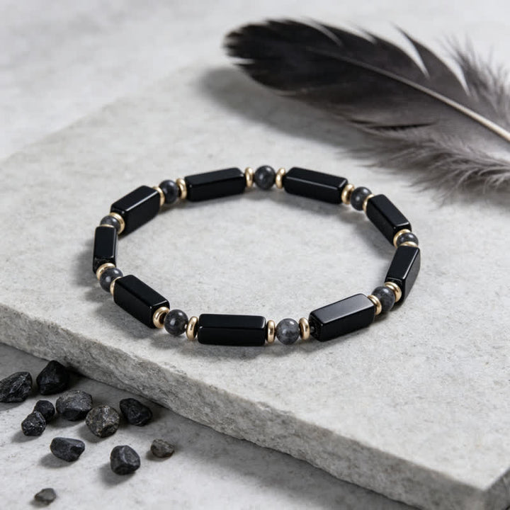 Bracciale Olivenorma con perline in pietra naturale e simbolo di protezione e resistenza. - image 1
