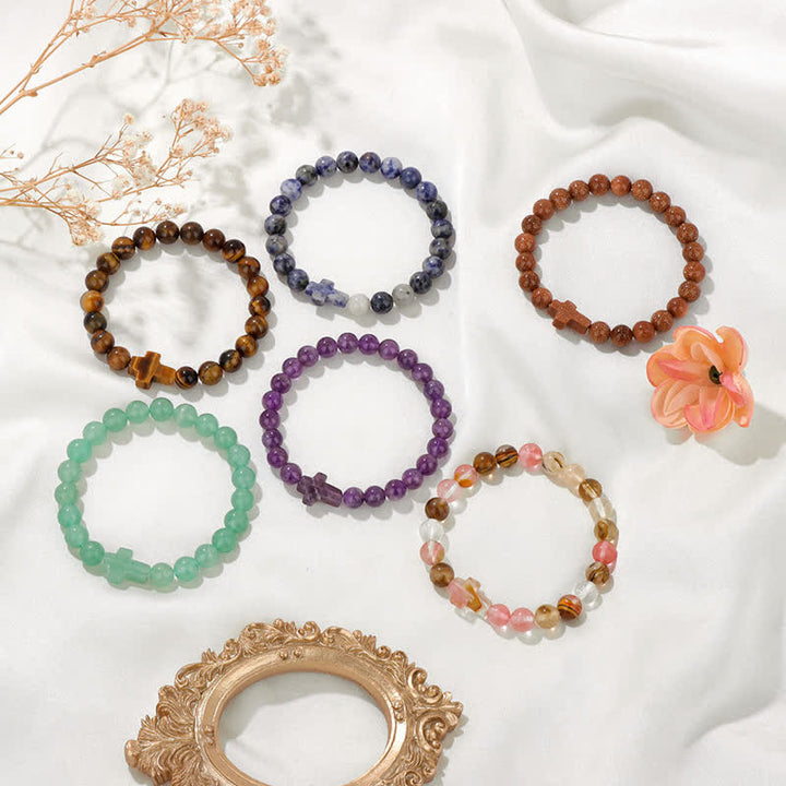 Bracciale Olivenorma con croce in pietre preziose naturali, design minimalista, simbolo di fede. - image 2