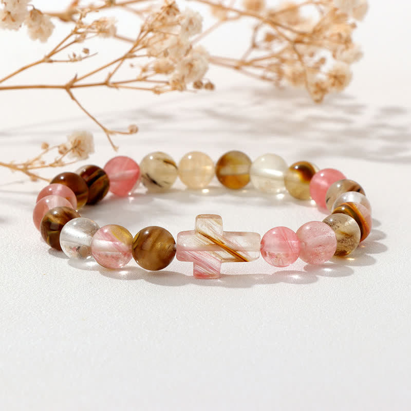 Bracciale Olivenorma con croce in pietre preziose naturali, design minimalista, simbolo di fede. - Noccioli di anguria misti - image 0