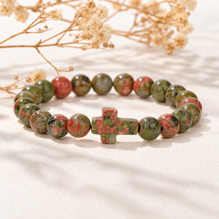 Bracciale Olivenorma con croce in pietre preziose naturali, design minimalista, simbolo di fede. - Unakite - image 24