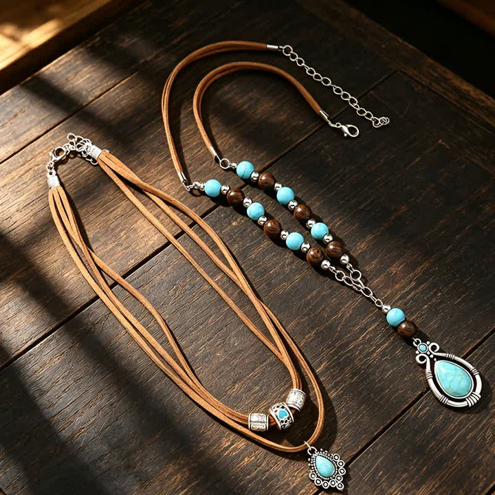 Collana a strati Olivenorma con turchese, design e simbolo di protezione spirituale. - image 9